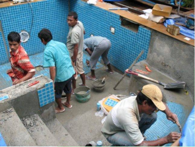 Pool construction with workers